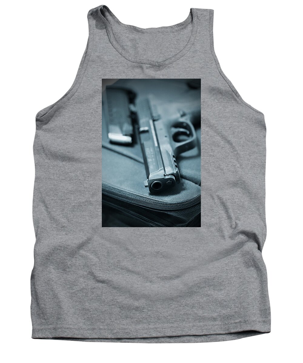 Armed Tank Top featuring the photograph On the Lam by Trish Mistric