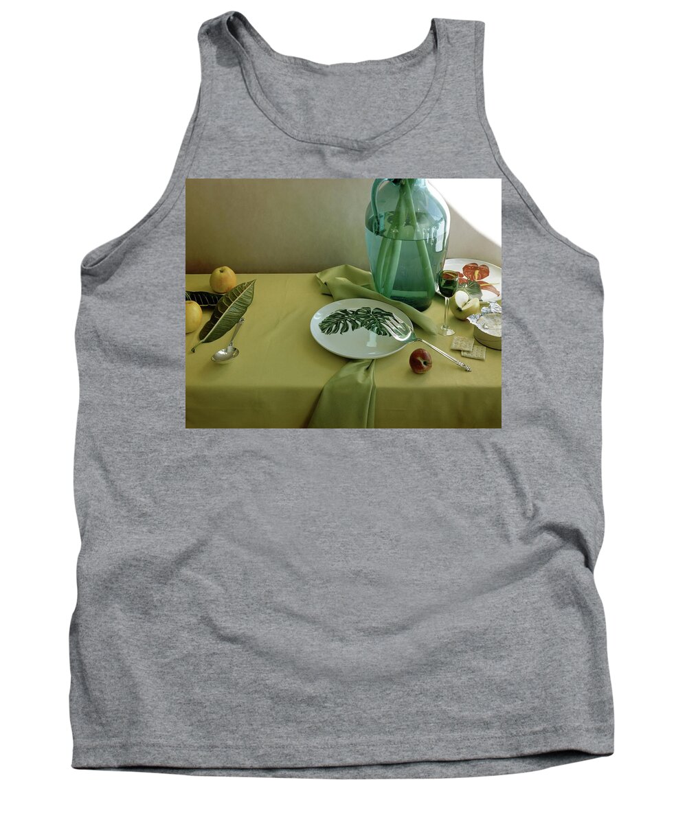 Table Setting Tank Top featuring the photograph Plates, Apples And A Vase On A Green Tablecloth by Horst P. Horst