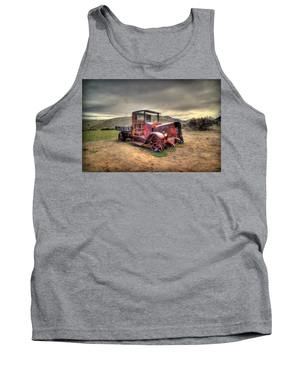 Redtired Tank Top featuring the photograph RedTired by Ryan Smith