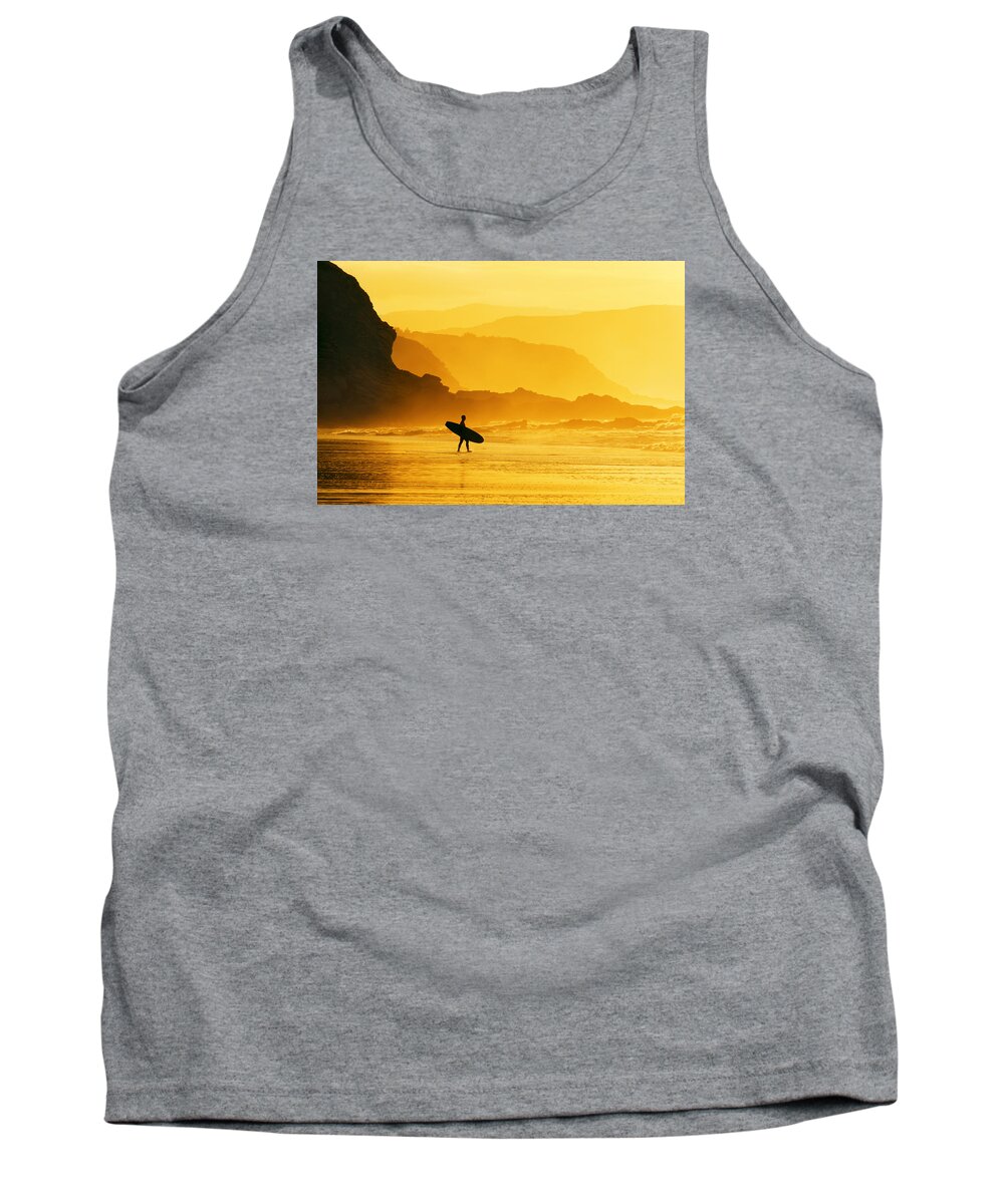 Surfer Tank Top featuring the photograph Surfer Entering Water At Misty Sunset by Mikel Martinez de Osaba