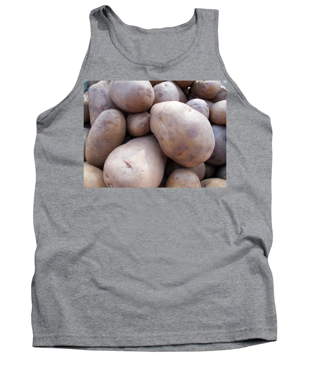 Potato Tank Top featuring the photograph A pile of large lumpy raw potatoes by Ashish Agarwal