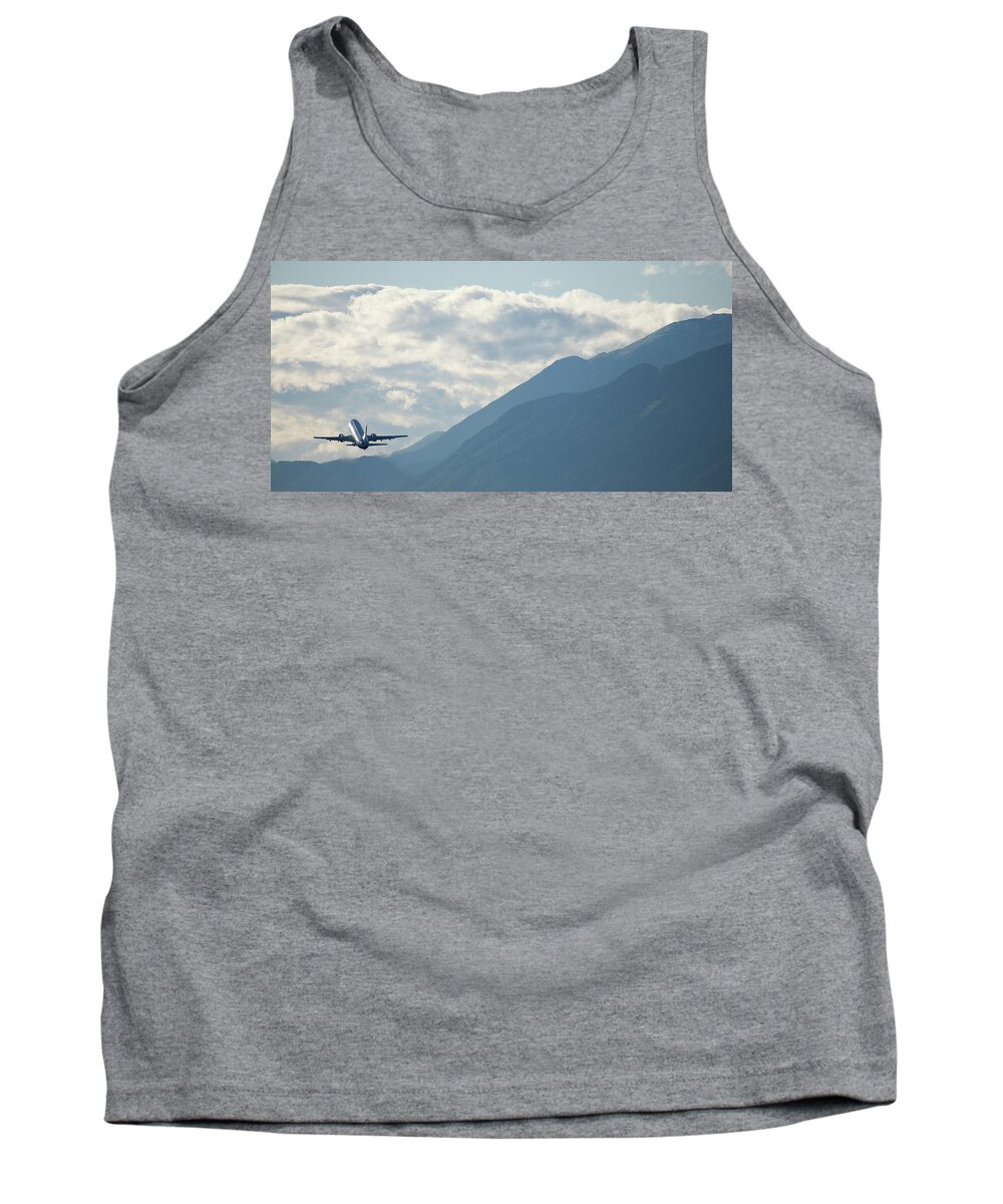Plane Tank Top featuring the photograph Airplane taking off over the alpine mountains by Ian Middleton