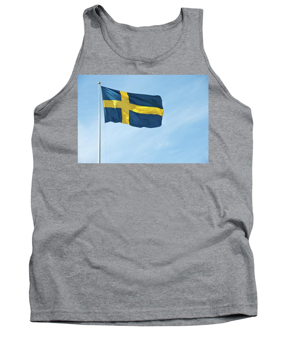 Sweden Tank Top featuring the photograph Flag of Sweden in the blue sky by GoodMood Art