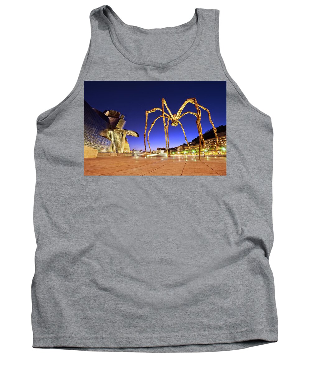Guggenheim Tank Top featuring the photograph Guggenheim museum and spider at night in Bilbao by Mikel Martinez de Osaba