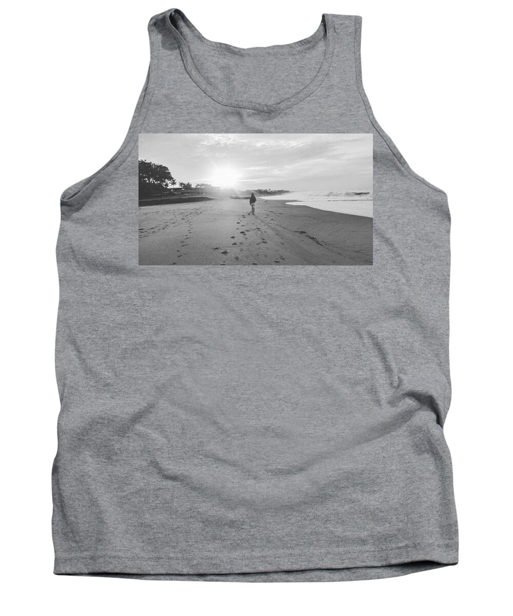 Black And White Tank Top featuring the photograph Walking on The Beach by Maria Marganingsih
