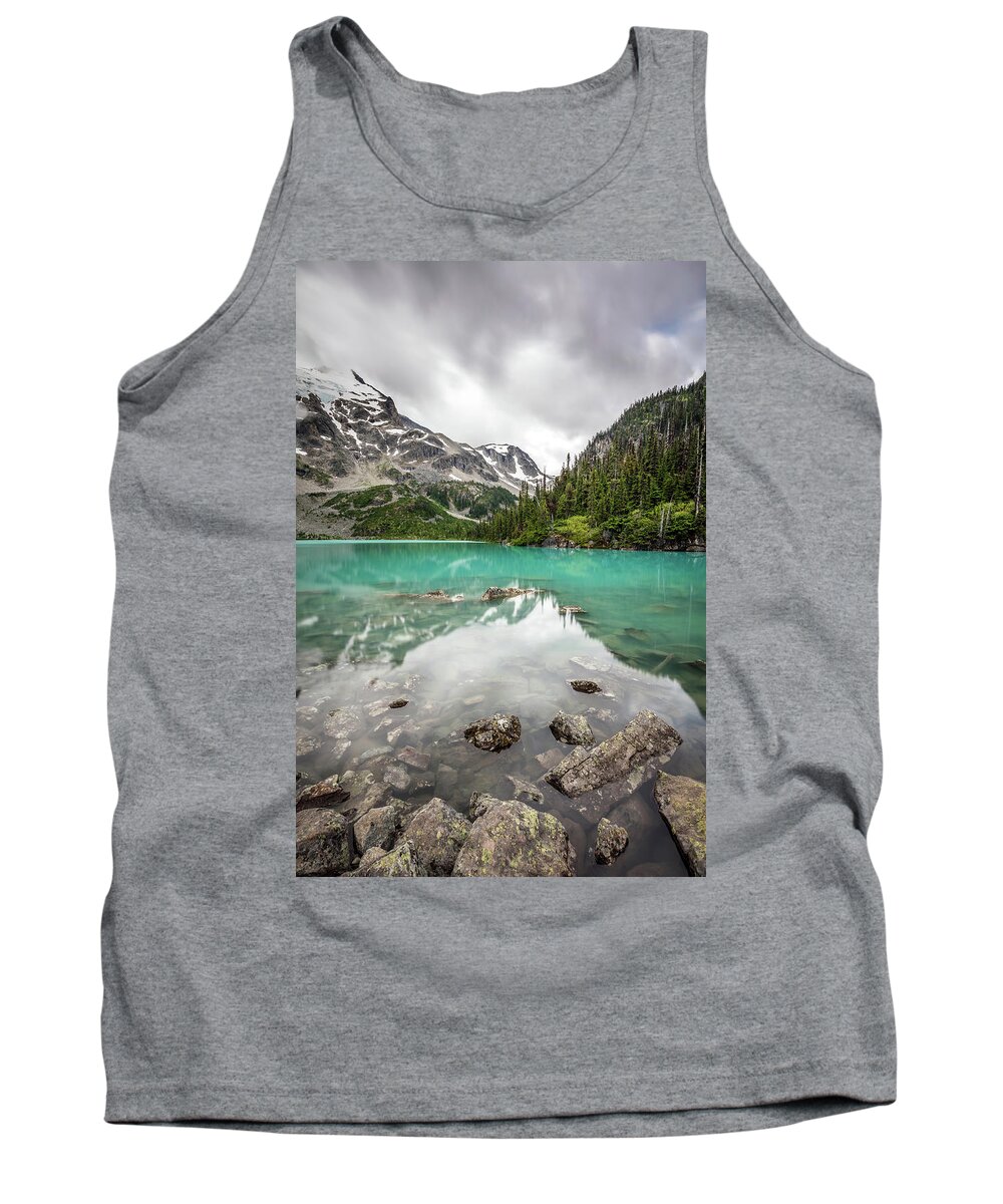 Turquoise Tank Top featuring the photograph Turquoise lake in the mountains by Pierre Leclerc Photography