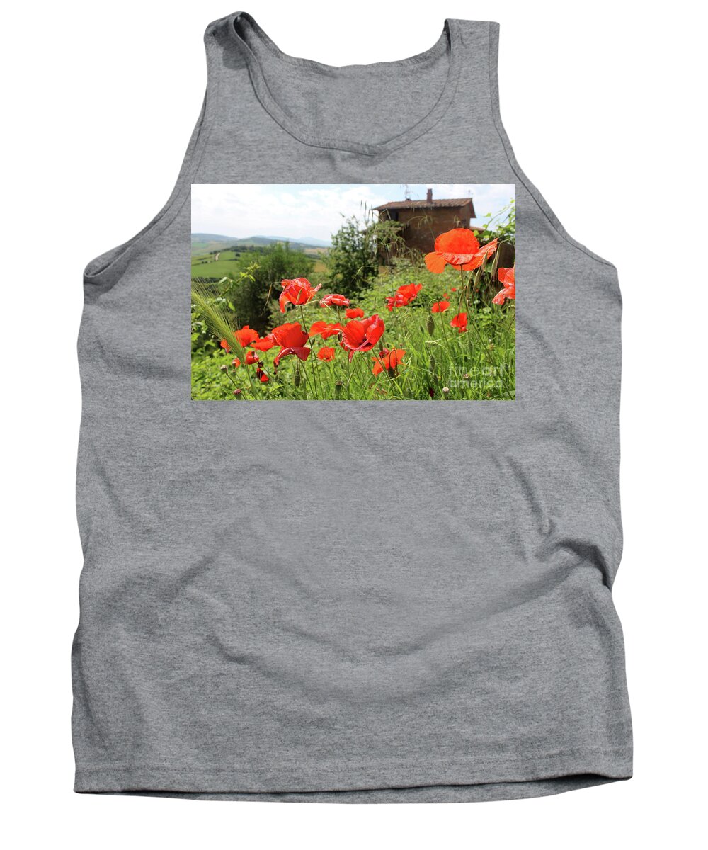 Poppy Tank Top featuring the photograph Wild red poppy flowers grow in the valley outside the city of Pi by Adam Long