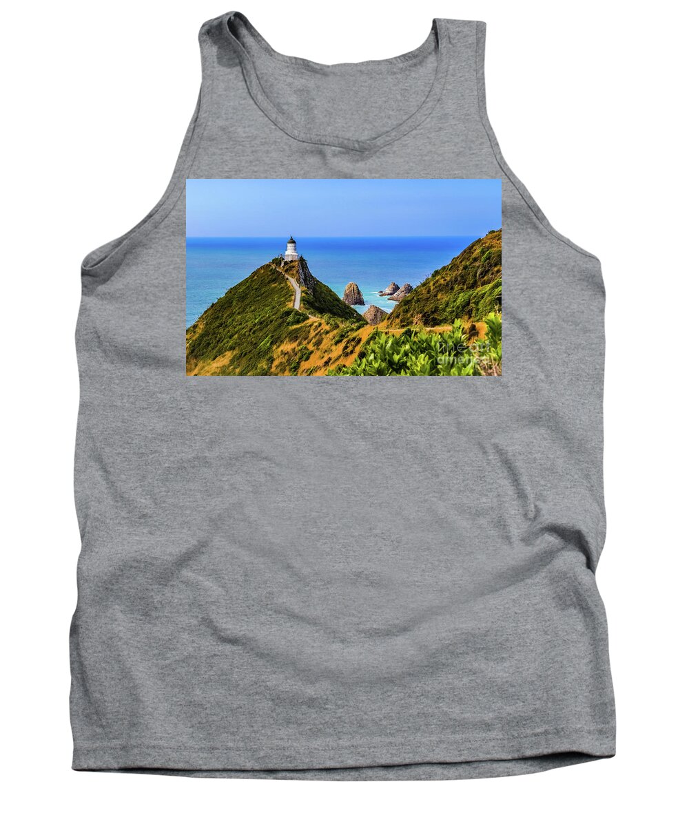 Lighthouse Tank Top featuring the photograph Nugget Point lighthouse, New Zealand by Lyl Dil Creations