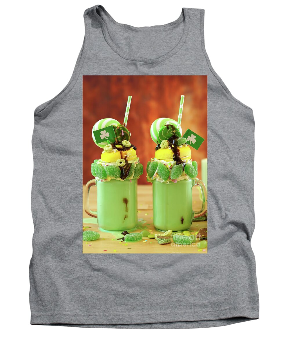 St Patricks Day Tank Top featuring the photograph St Patrick's Day on-trend holiday freak shakes with candy and lollipops. by Milleflore Images