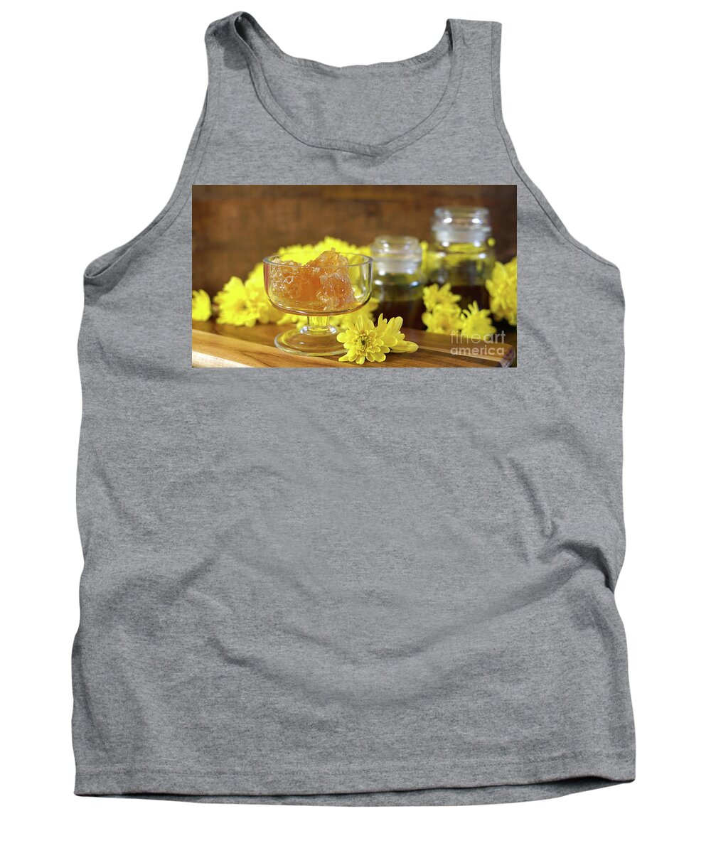 Honey Tank Top featuring the photograph Raw honeycomb with liquid honey in glass jar with lavendar. #1 by Milleflore Images