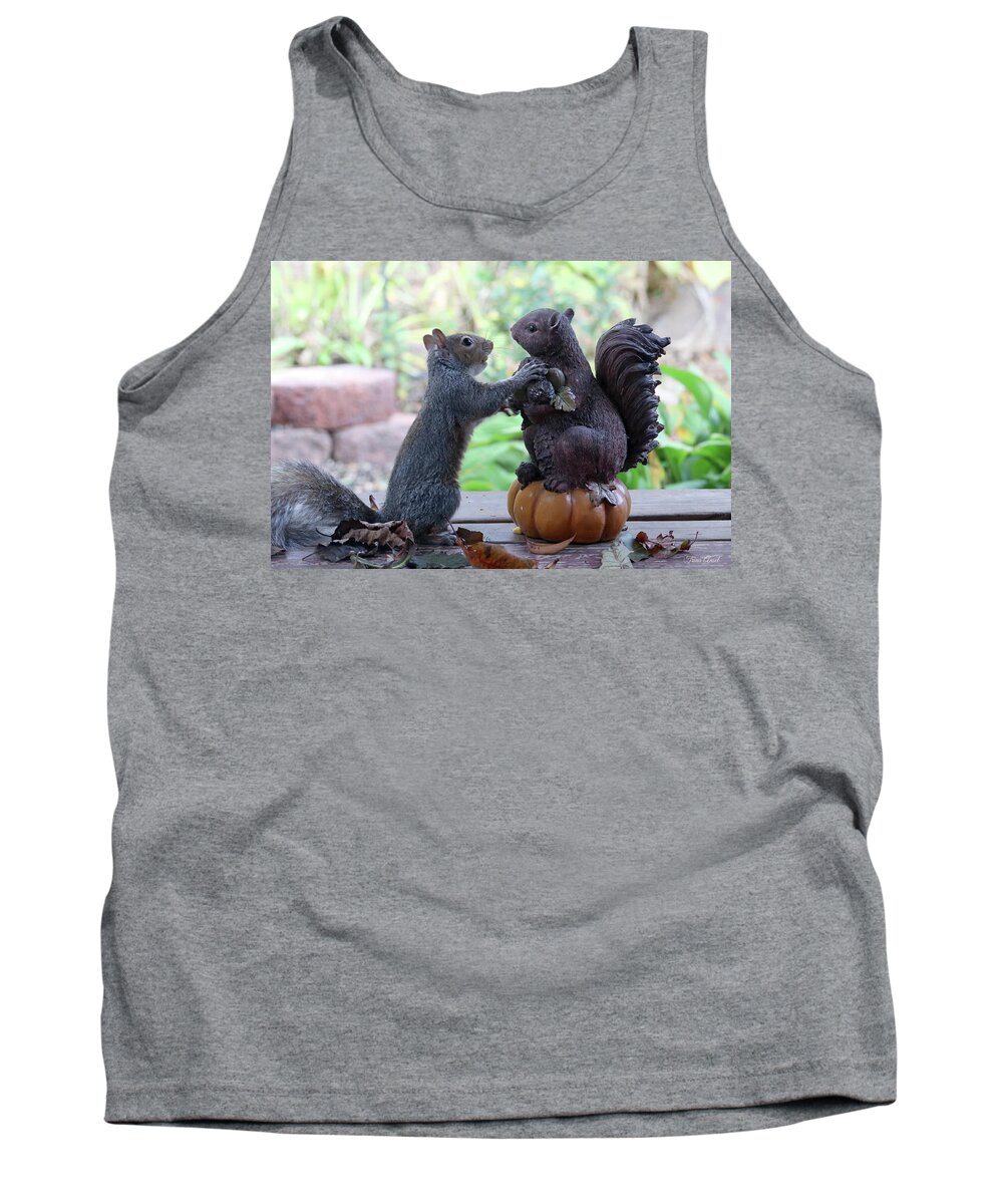 Squirrels Tank Top featuring the photograph Hand Over a Nut Please by Trina Ansel