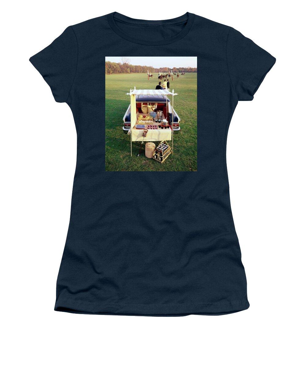 Food Women's T-Shirt featuring the photograph A Picnic Table Set Up On The Back Of A Car by Rudy Muller