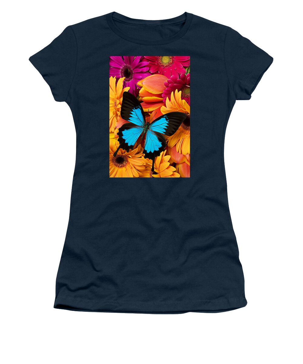 Butterfly Tulips Daisy�s Women's T-Shirt featuring the photograph Blue butterfly on brightly colored flowers by Garry Gay