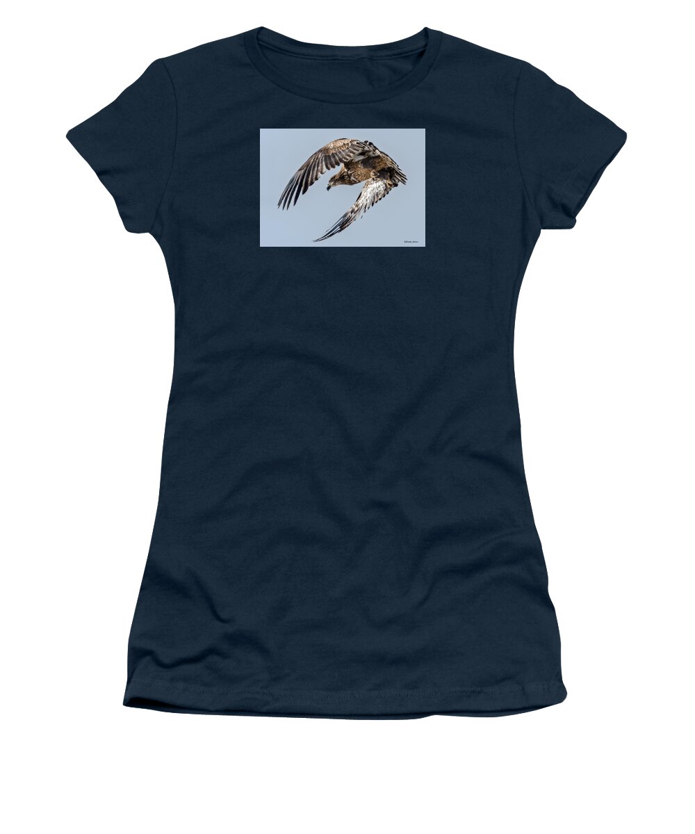 Bald Eagle Women's T-Shirt featuring the photograph Immature Bald Eagle Leaving a Perch by Stephen Johnson