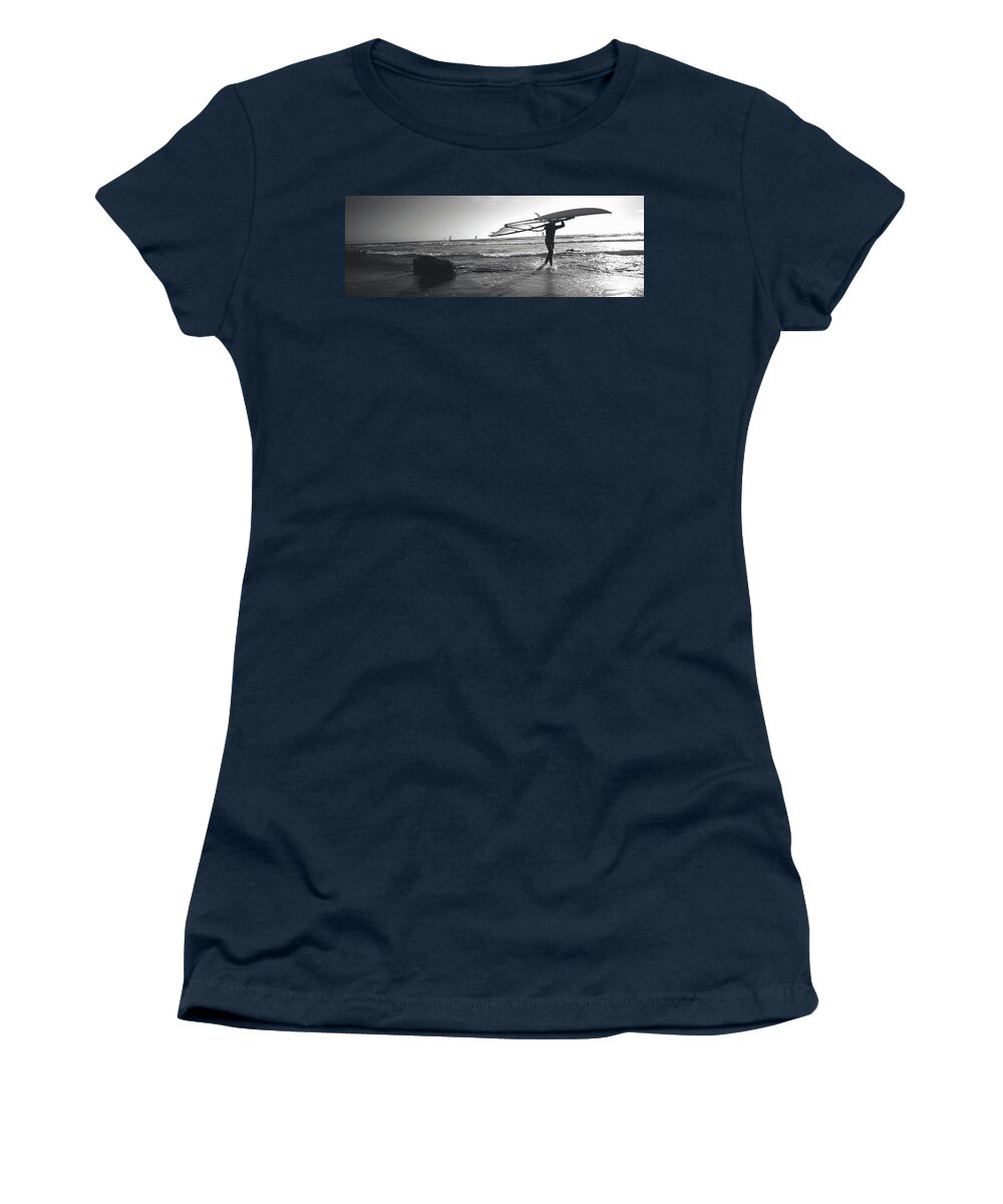 Photography Women's T-Shirt featuring the photograph Man Carrying A Surfboard Over His Head by Panoramic Images