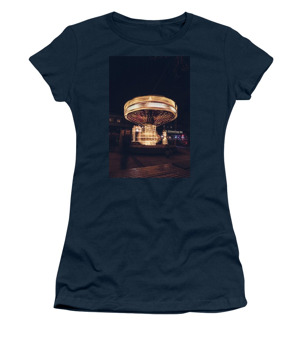 Illuminations Women's T-Shirt featuring the photograph Christmas carousel on the streets of Warsaw. Fire Wheel by Vaclav Sonnek
