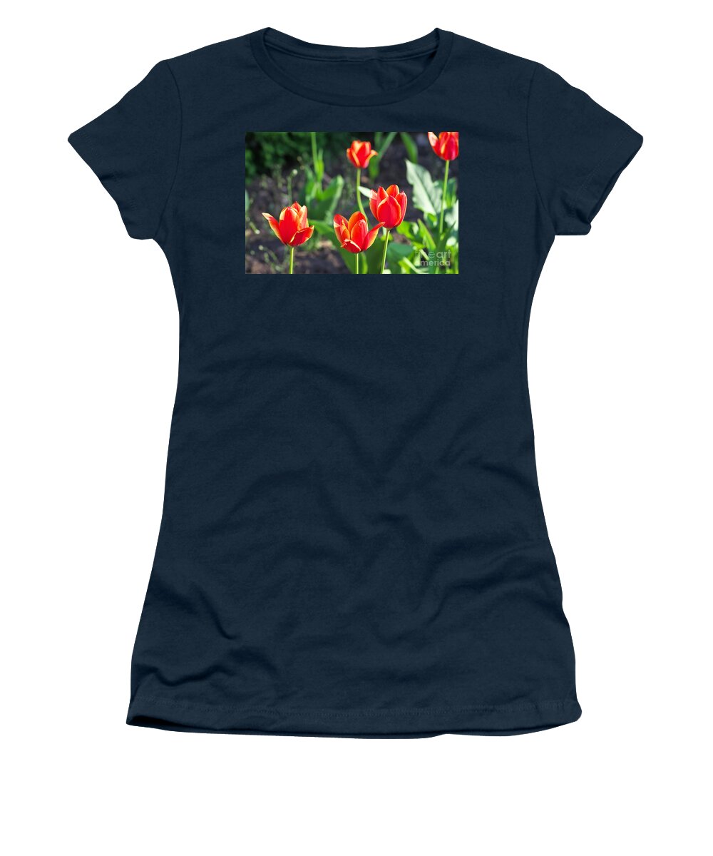 Background Women's T-Shirt featuring the photograph Spring flowerbed with red tulip flowers. by Boon Mee