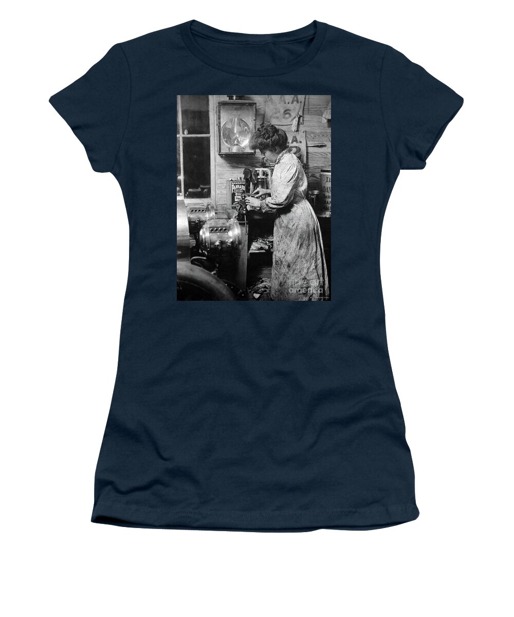 1910 Women's T-Shirt featuring the photograph Woman polishing early vehicle headlamps 1910 by Retrographs