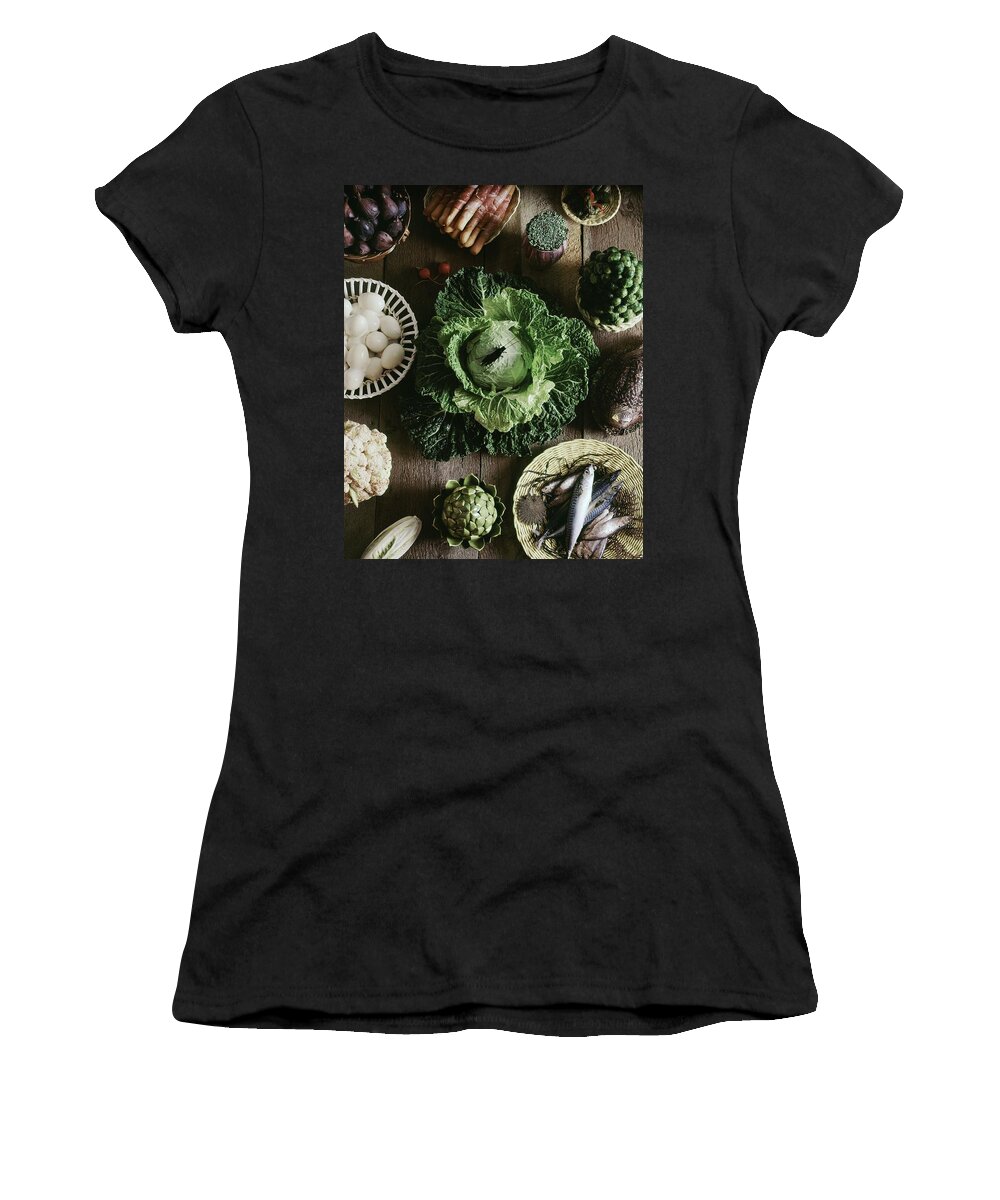 Decorative Art Women's T-Shirt featuring the photograph A Mixed Variety Of Food And Ceramic Imitations by Fotiades