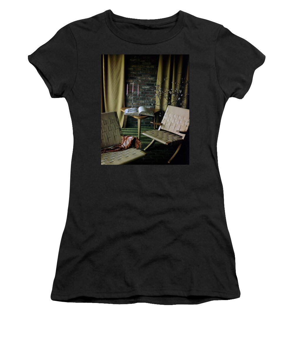 Nobody Women's T-Shirt featuring the photograph An Armchair Beside A Table And An Old Book by Horst P. Horst