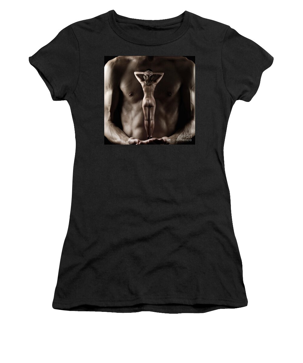 Nude Women's T-Shirt featuring the photograph Man Holding a Naked Fitness Woman in His Hands by Maxim Images Exquisite Prints