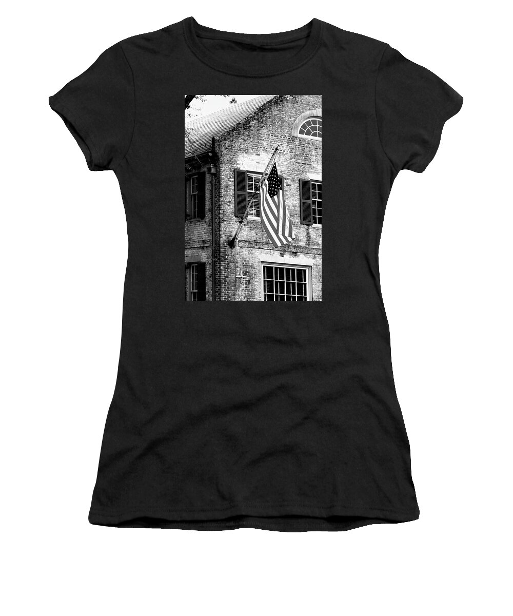 Colonial Women's T-Shirt featuring the photograph US Flag in Colonial Williamsbug by Emanuel Tanjala