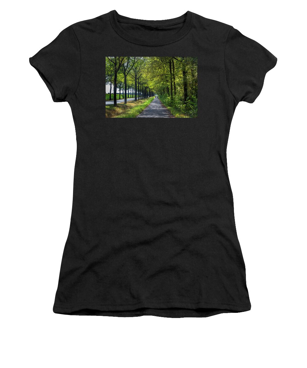 Spring Women's T-Shirt featuring the photograph Cycling in Holland by Debra and Dave Vanderlaan