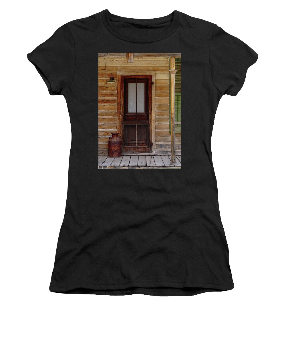 Bodie State Historic Park Women's T-Shirt featuring the photograph Bodie Door With Milk Can by Brett Harvey