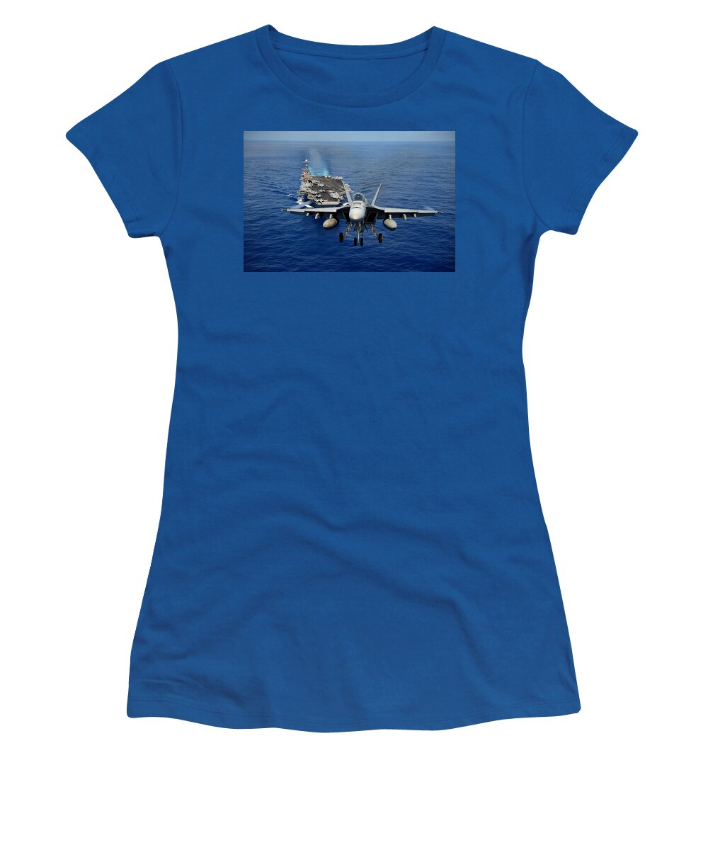 Chinfo Women's T-Shirt featuring the photograph An F/A-18 Hornet demonstrates air power. by Sebastian Musial