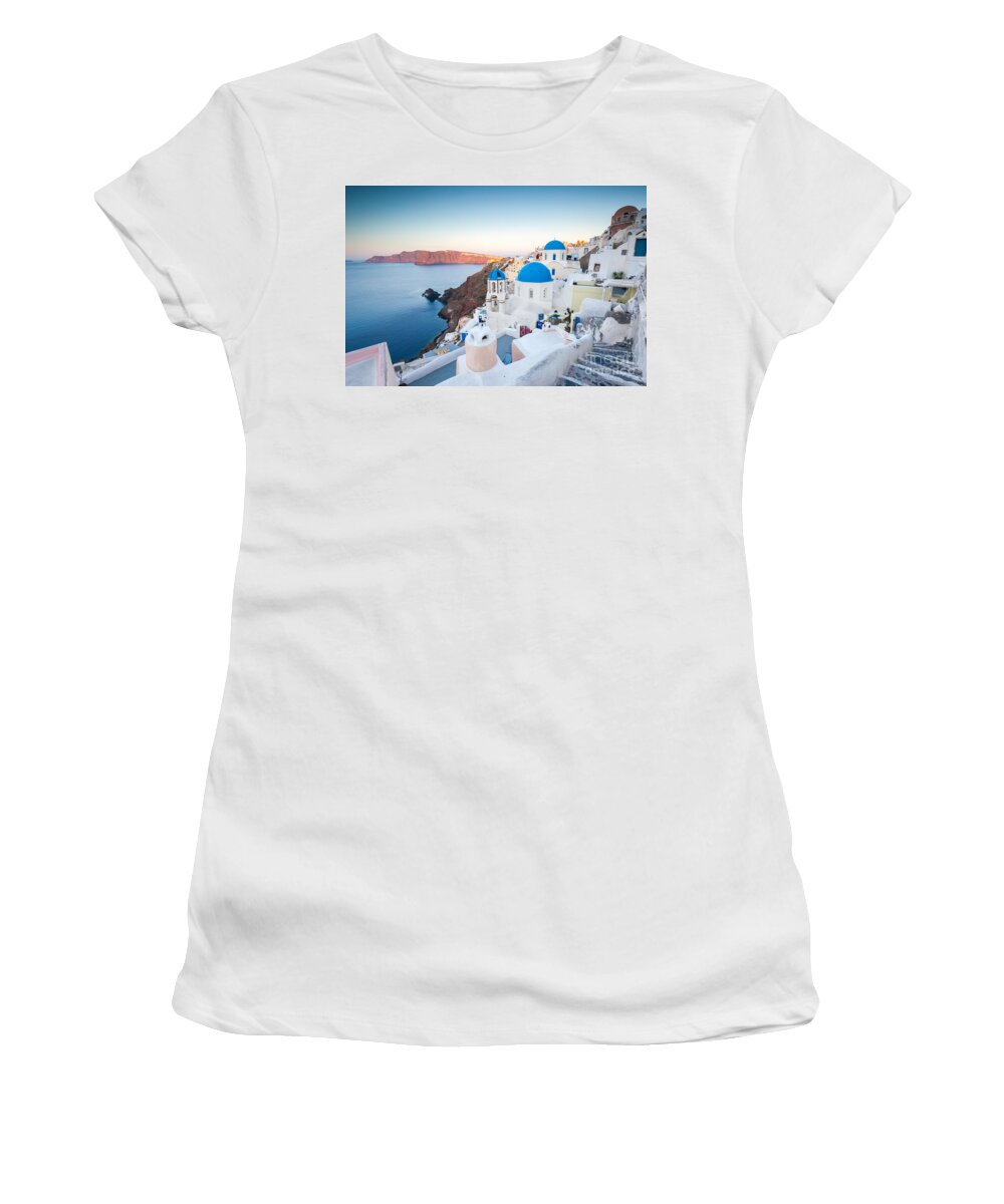 Santorini Women's T-Shirt featuring the photograph Beautiful village of Oia at sunrise - Santorini - Greece #1 by Matteo Colombo