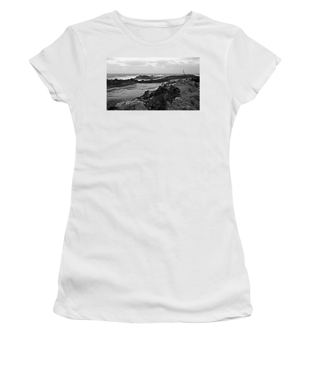 Beach Women's T-Shirt featuring the photograph A tempest in Minorca north shore - Far far lighthouse in white sea by Pedro Cardona Llambias