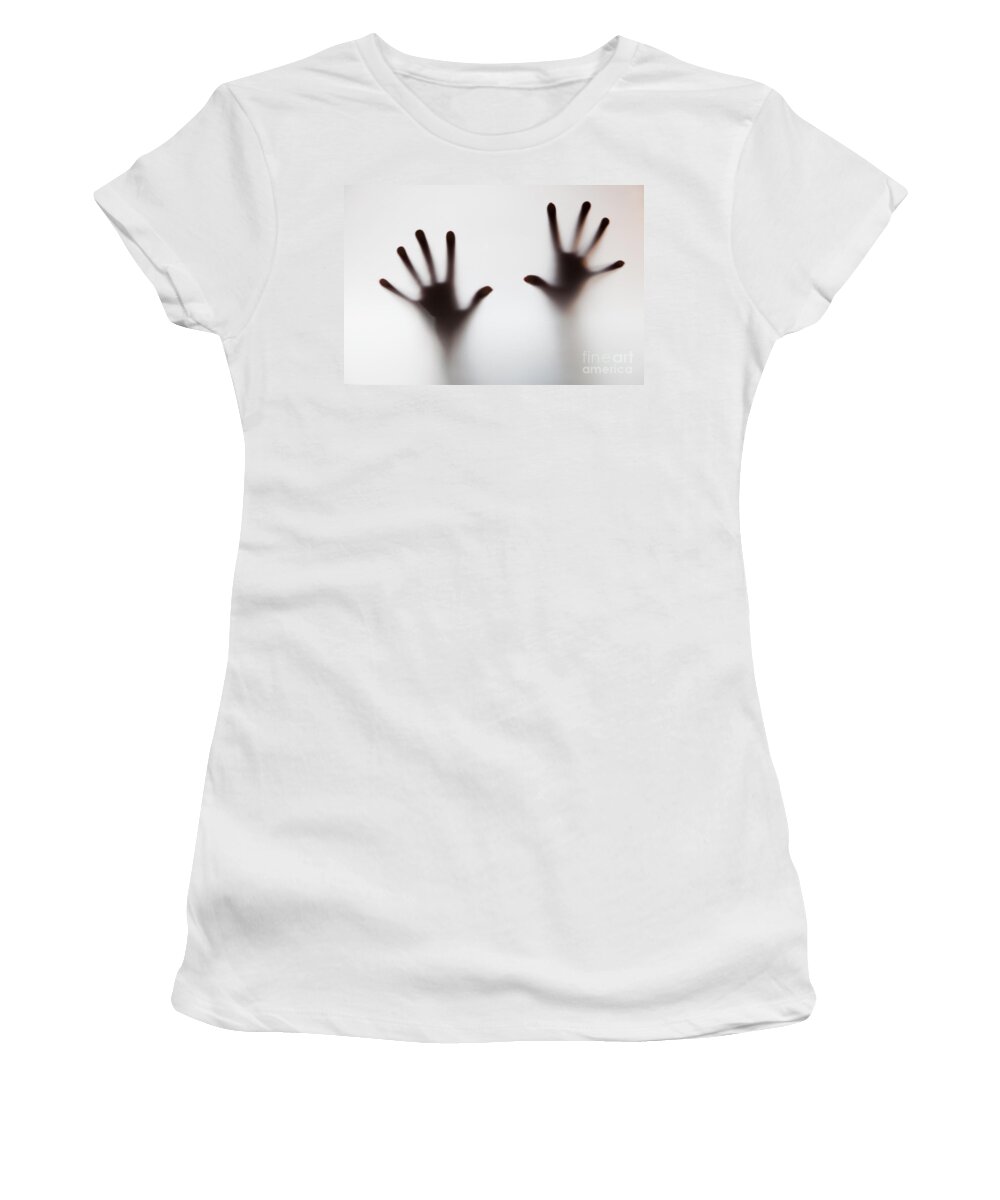 Hands Women's T-Shirt featuring the photograph Hands touching frosted glass #1 by Michal Bednarek