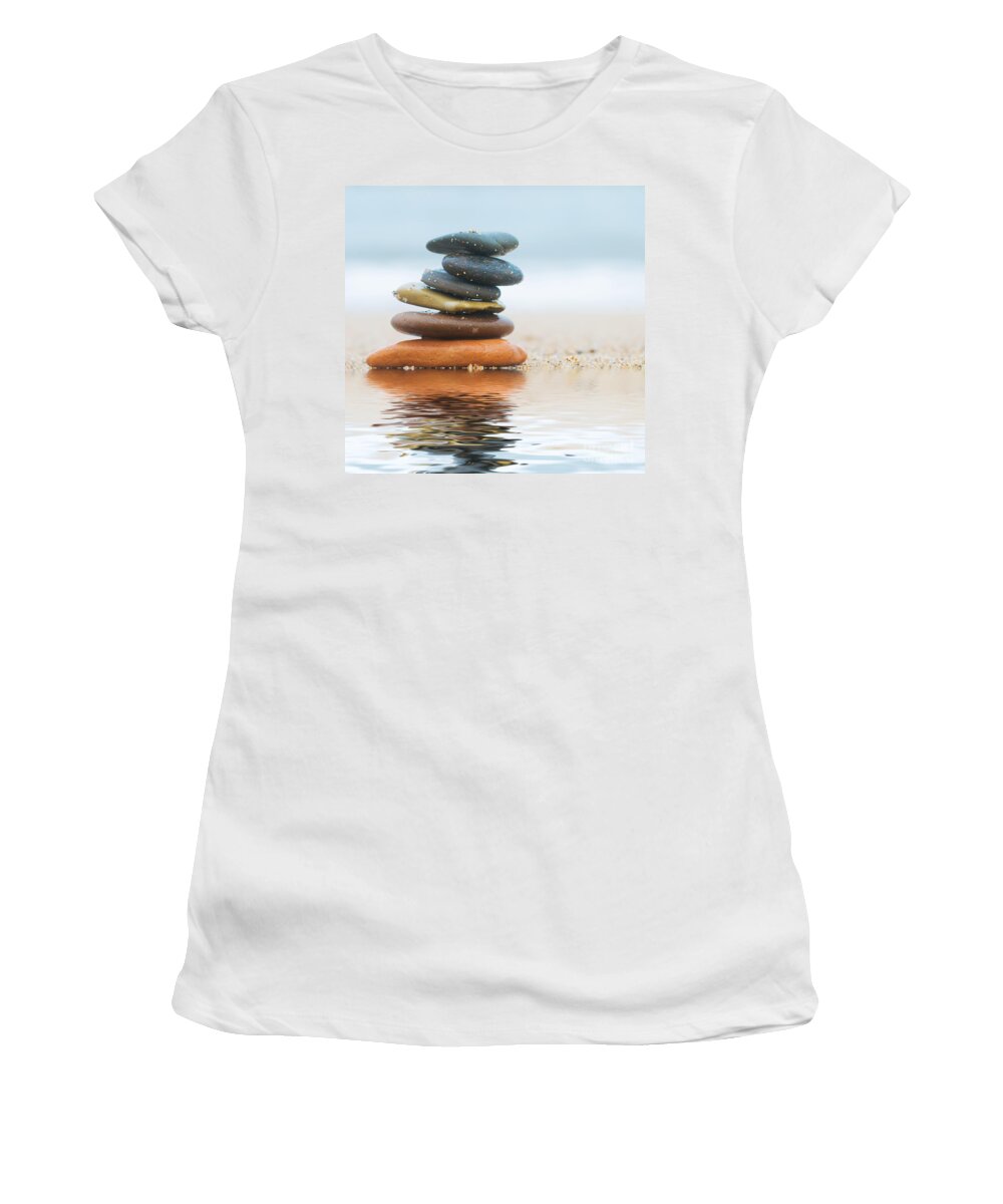 Stone Women's T-Shirt featuring the photograph Stack of beach stones on sand #2 by Michal Bednarek