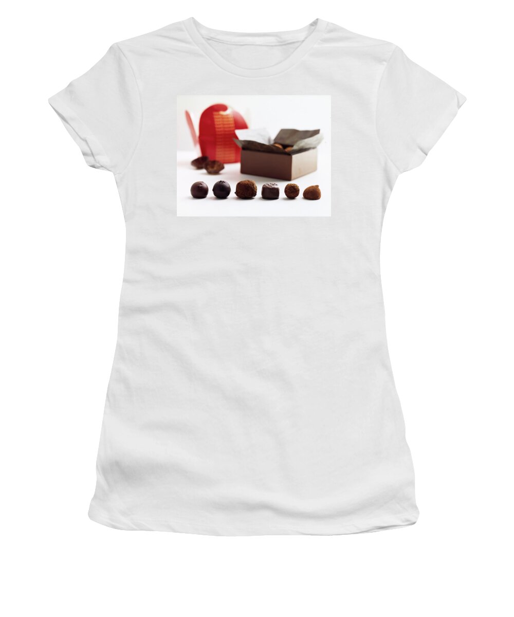 Cooking Women's T-Shirt featuring the photograph A Still Life Photo Of Gourmet Chocolates by Romulo Yanes