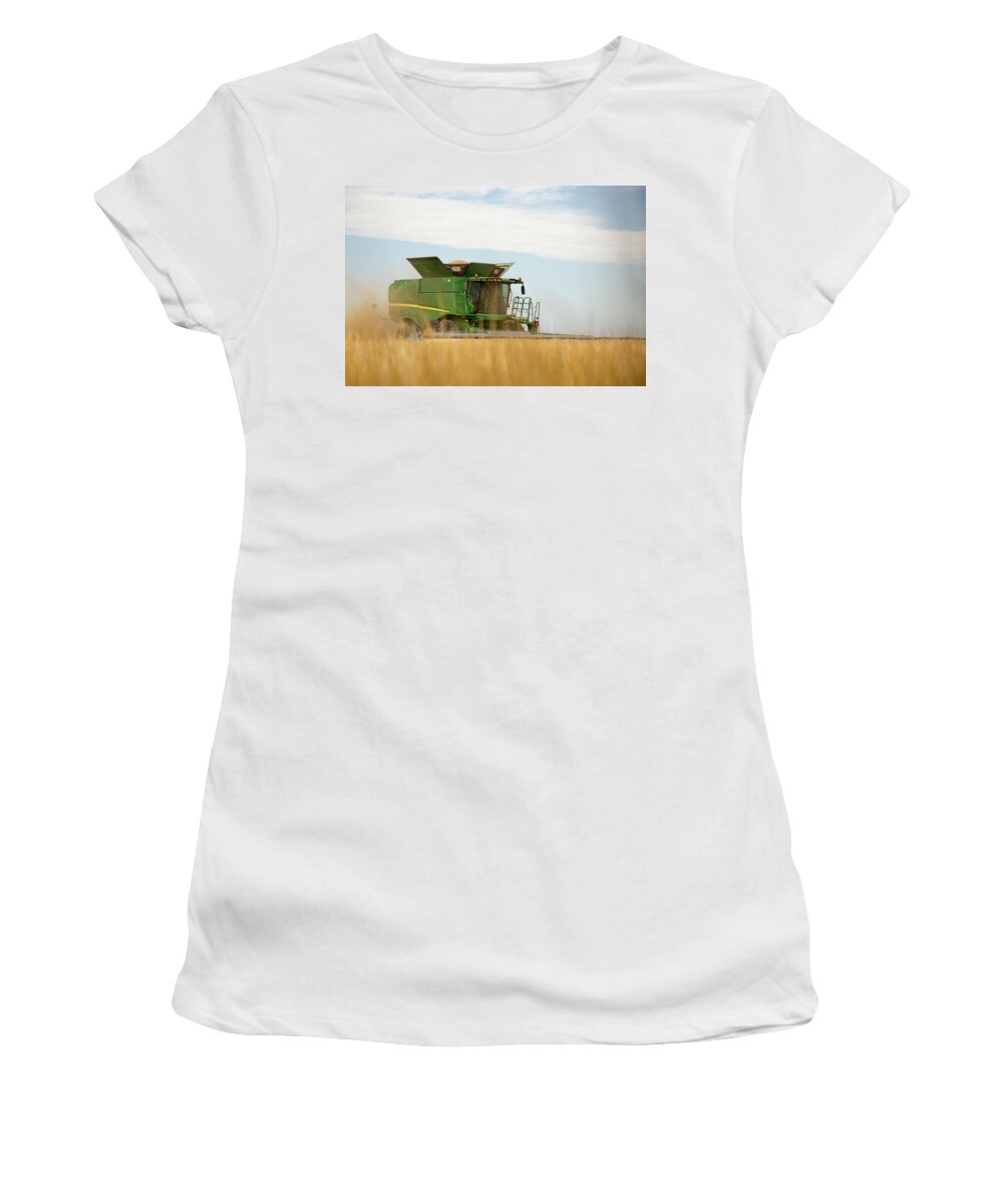 Combine Women's T-Shirt featuring the photograph Combine Cuts Wheat In Northeast by Kevan Dee
