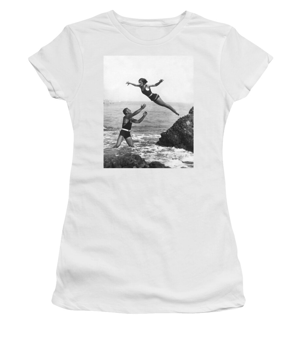 1920s Women's T-Shirt featuring the photograph Leap Into Life Guard's Arms by Underwood Archives