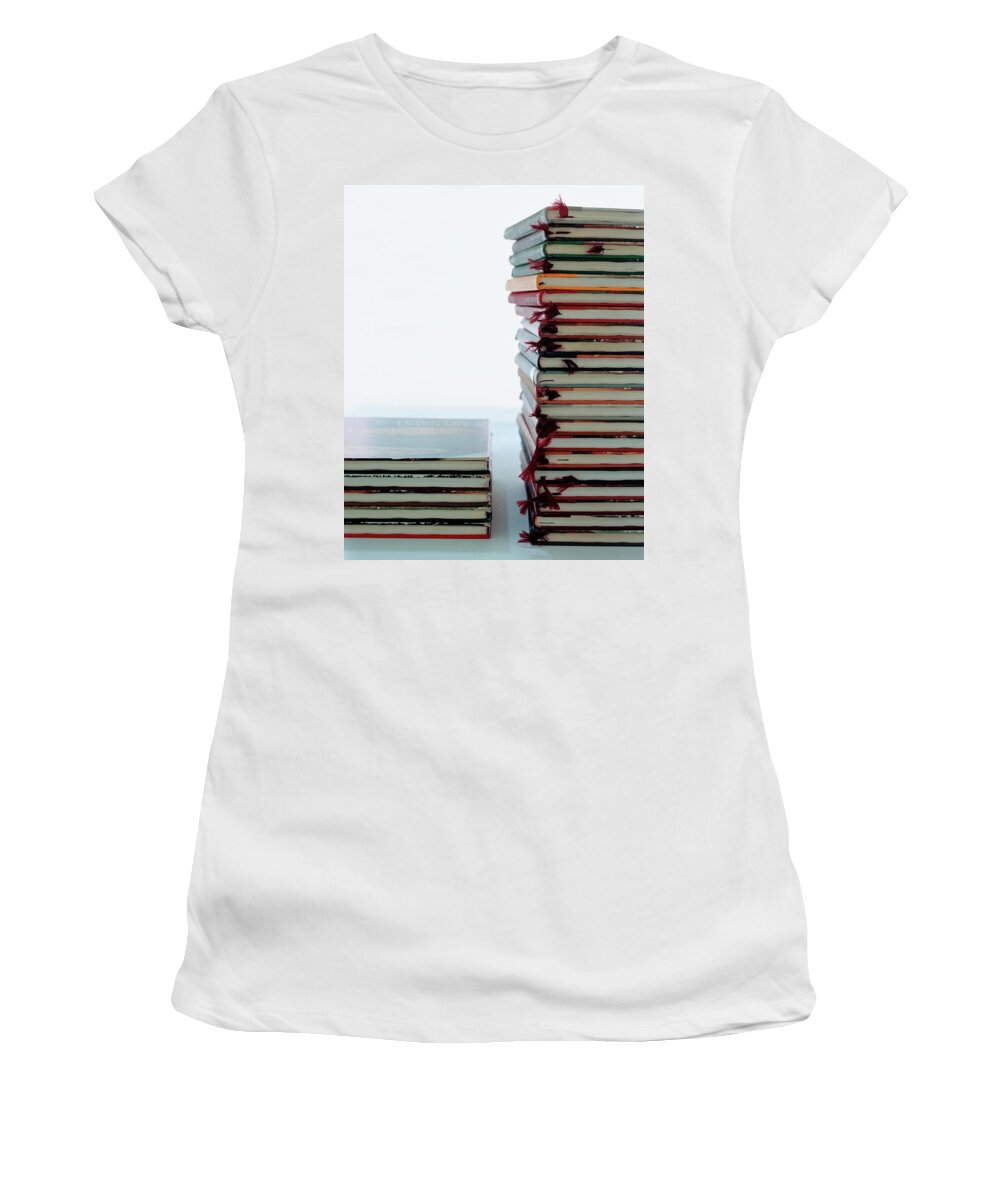 Arts Women's T-Shirt featuring the photograph Two Stacks Of Books by Romulo Yanes