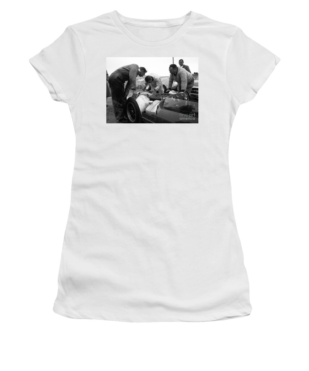 Can-am Women's T-Shirt featuring the photograph Bruce Mclaren working with Crew in pit at Laguna Seca by Robert K Blaisdell