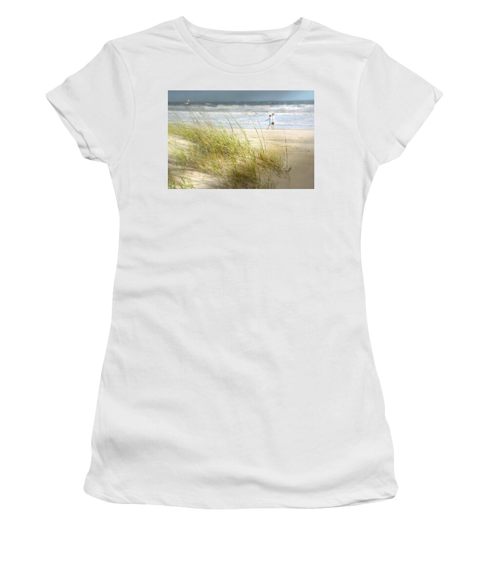 Couple Walking On The Beach Women's T-Shirt featuring the photograph Mid Morning Stroll by Diana Angstadt