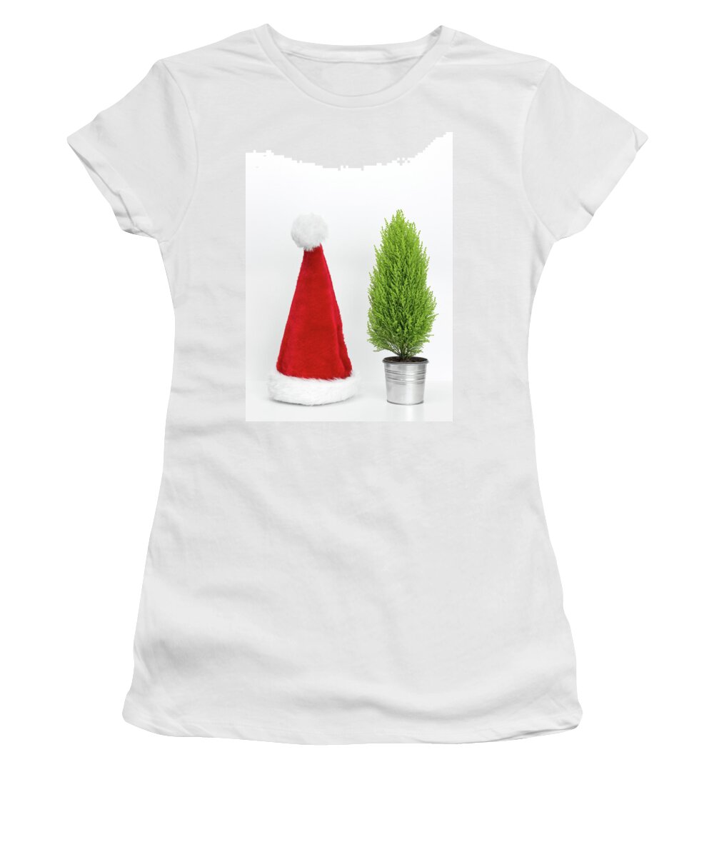 Santa Hat Women's T-Shirt featuring the photograph Santa hat and little Christmas tree by GoodMood Art