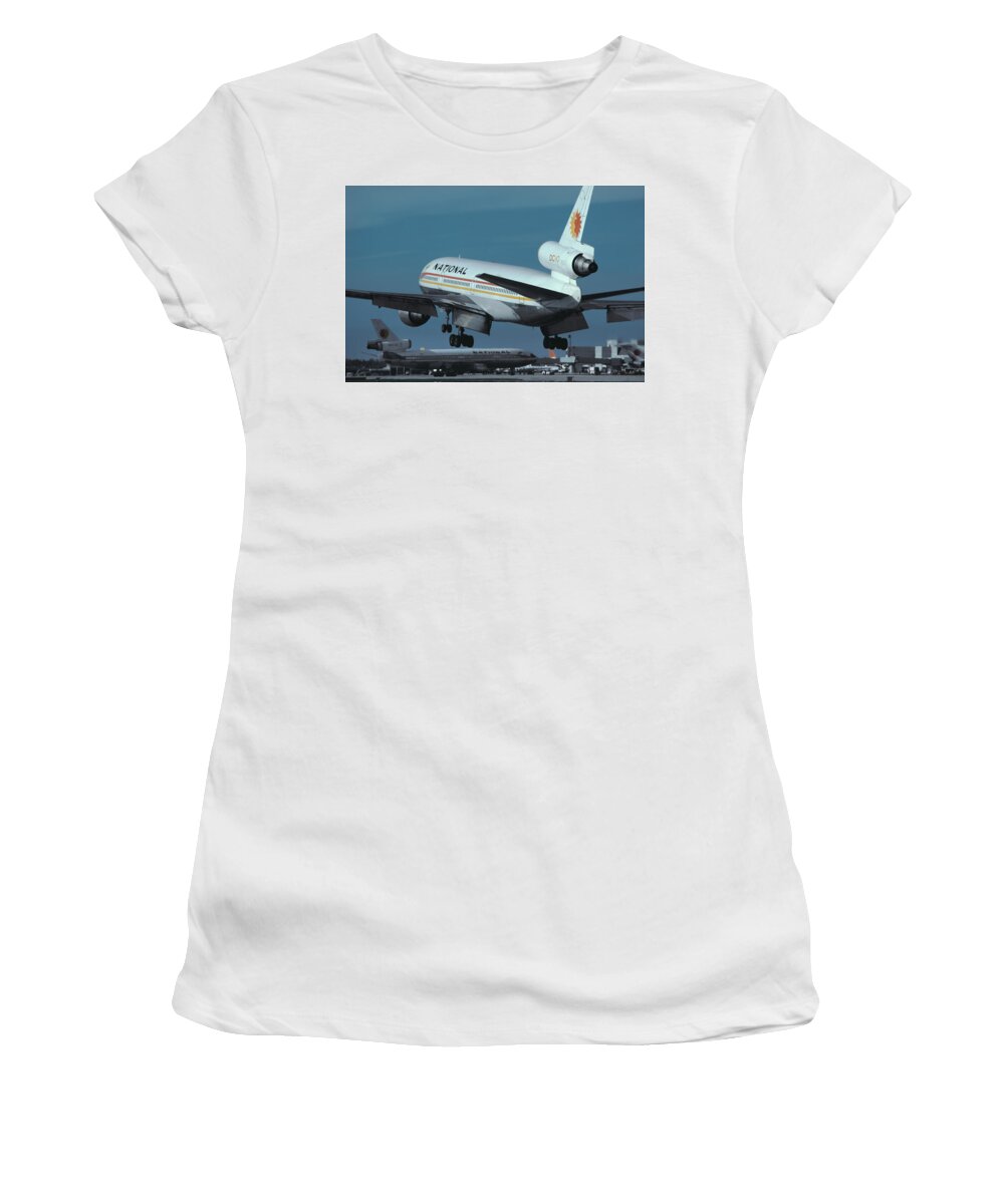National Airlines Women's T-Shirt featuring the photograph National Airlines DC-10 Landing at Miami International by Erik Simonsen