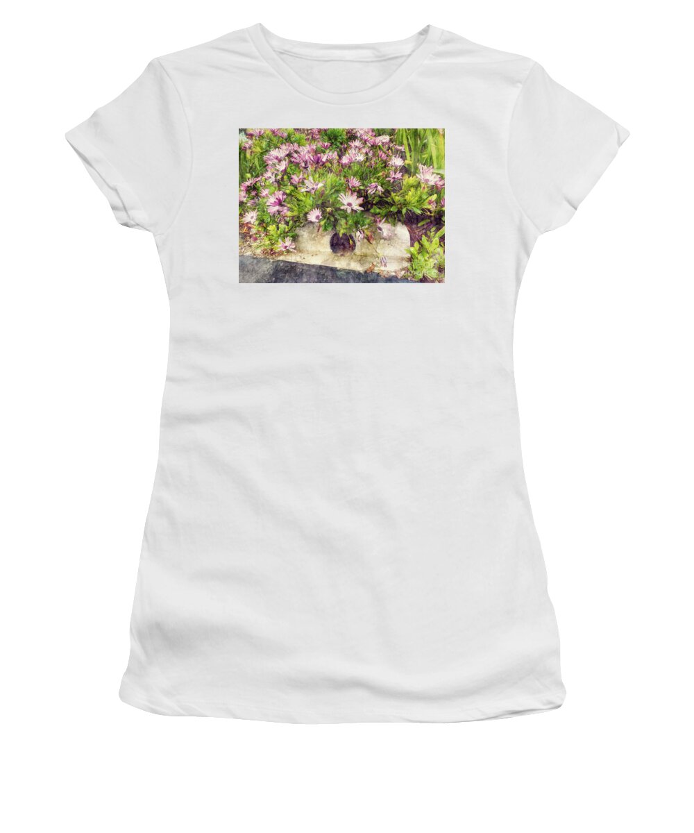 Pink Flowers Women's T-Shirt featuring the photograph Flowers over a Storm Drain by Davy Cheng