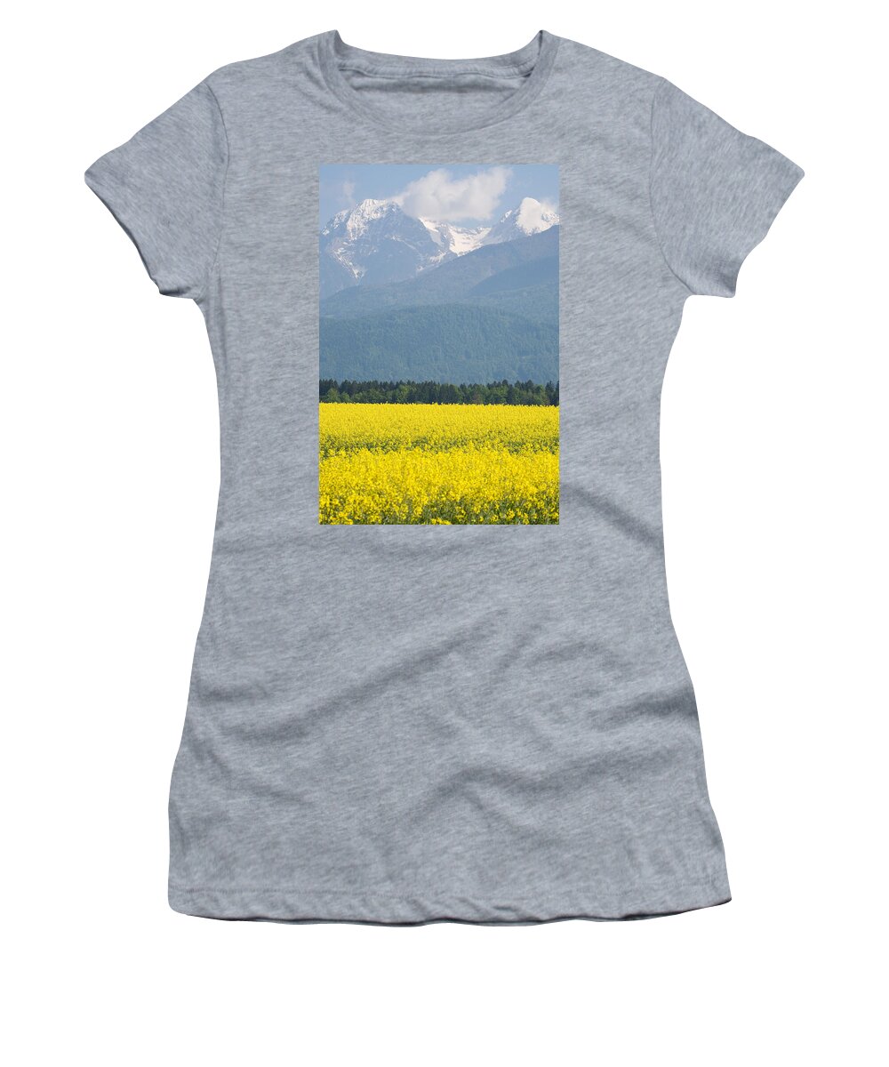 Brnik Women's T-Shirt featuring the photograph rapeseed field in Brnik with Kamnik Alps in the background #4 by Ian Middleton