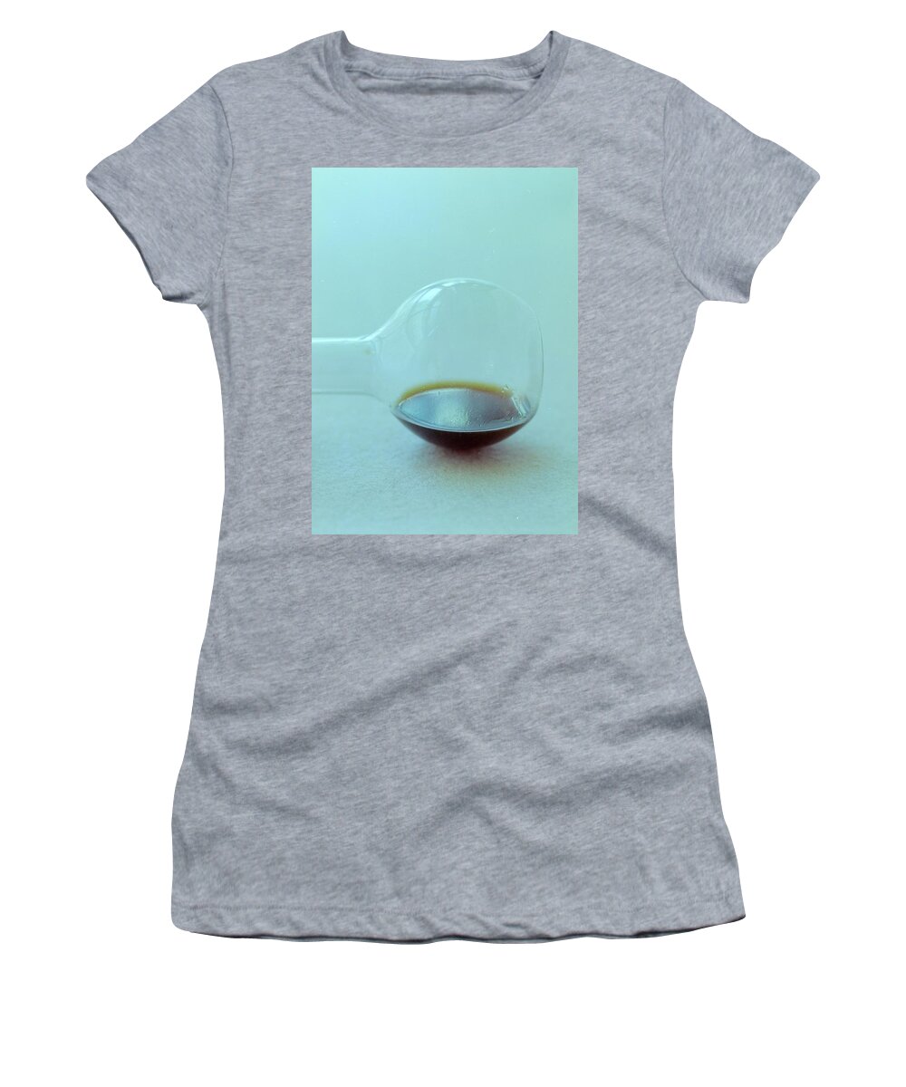 Condiment Women's T-Shirt featuring the photograph A Beaker With Vinegar by Romulo Yanes