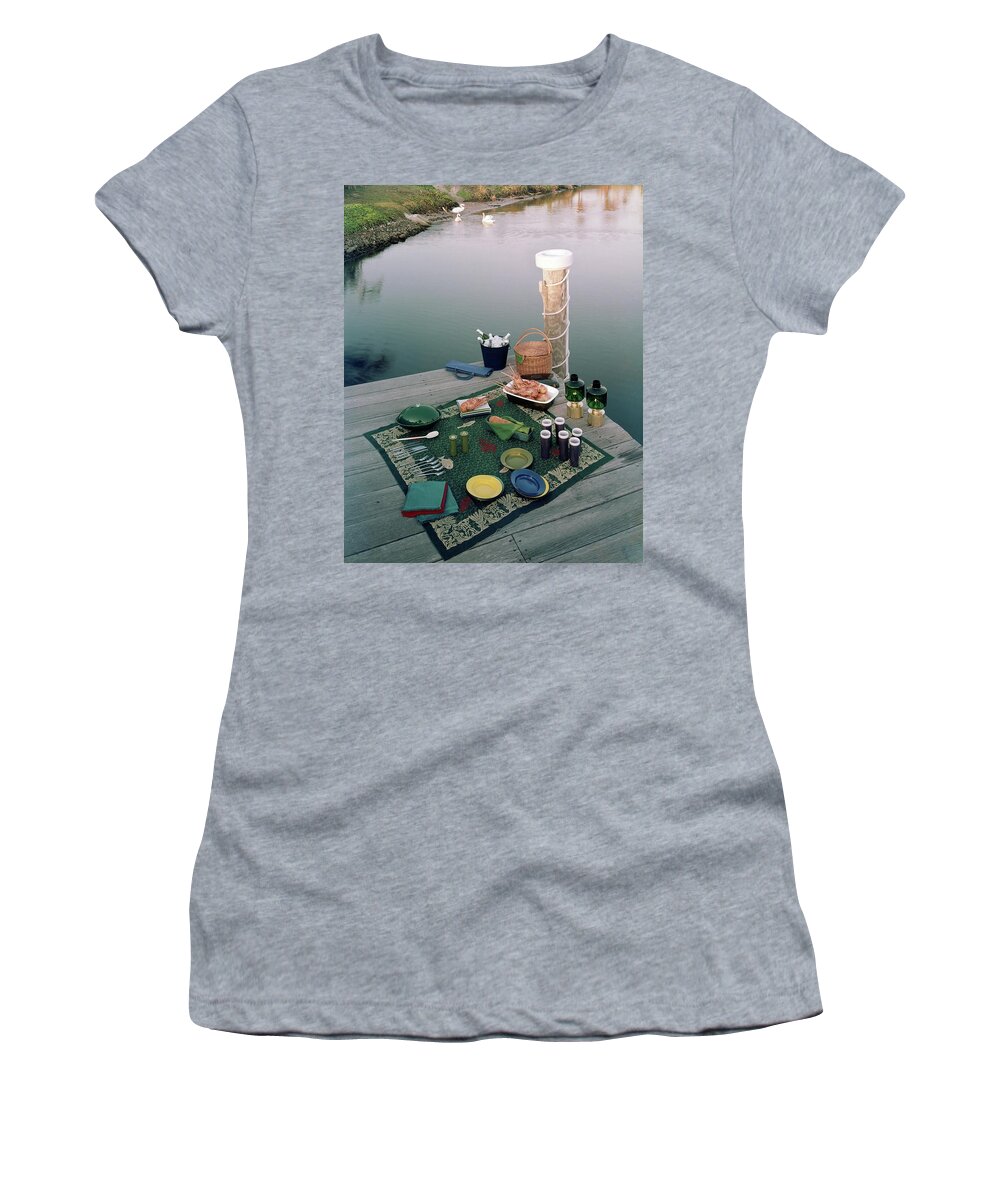 Exterior Women's T-Shirt featuring the photograph A Picnic Set Up On A Dock by Ernst Beadle