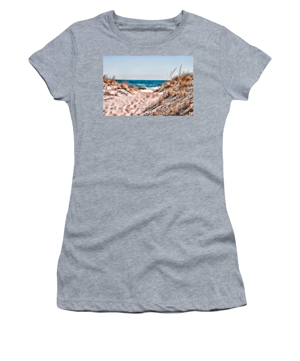 Beach Retaining Fence Women's T-Shirt featuring the photograph A walk out to the water by Jeff Folger