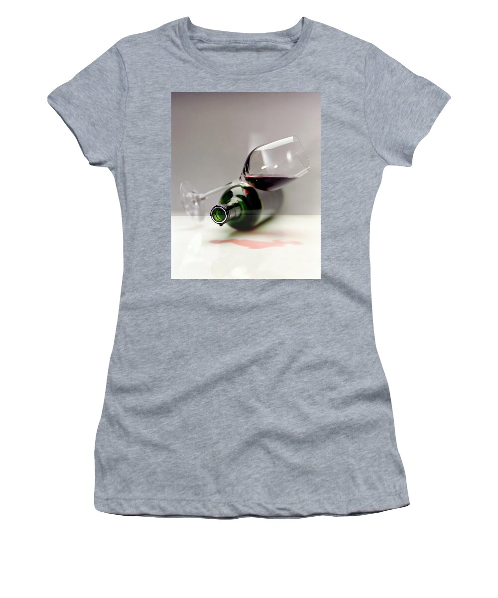 Beverage Women's T-Shirt featuring the photograph A Wine Bottle And A Glass Of Wine by Romulo Yanes