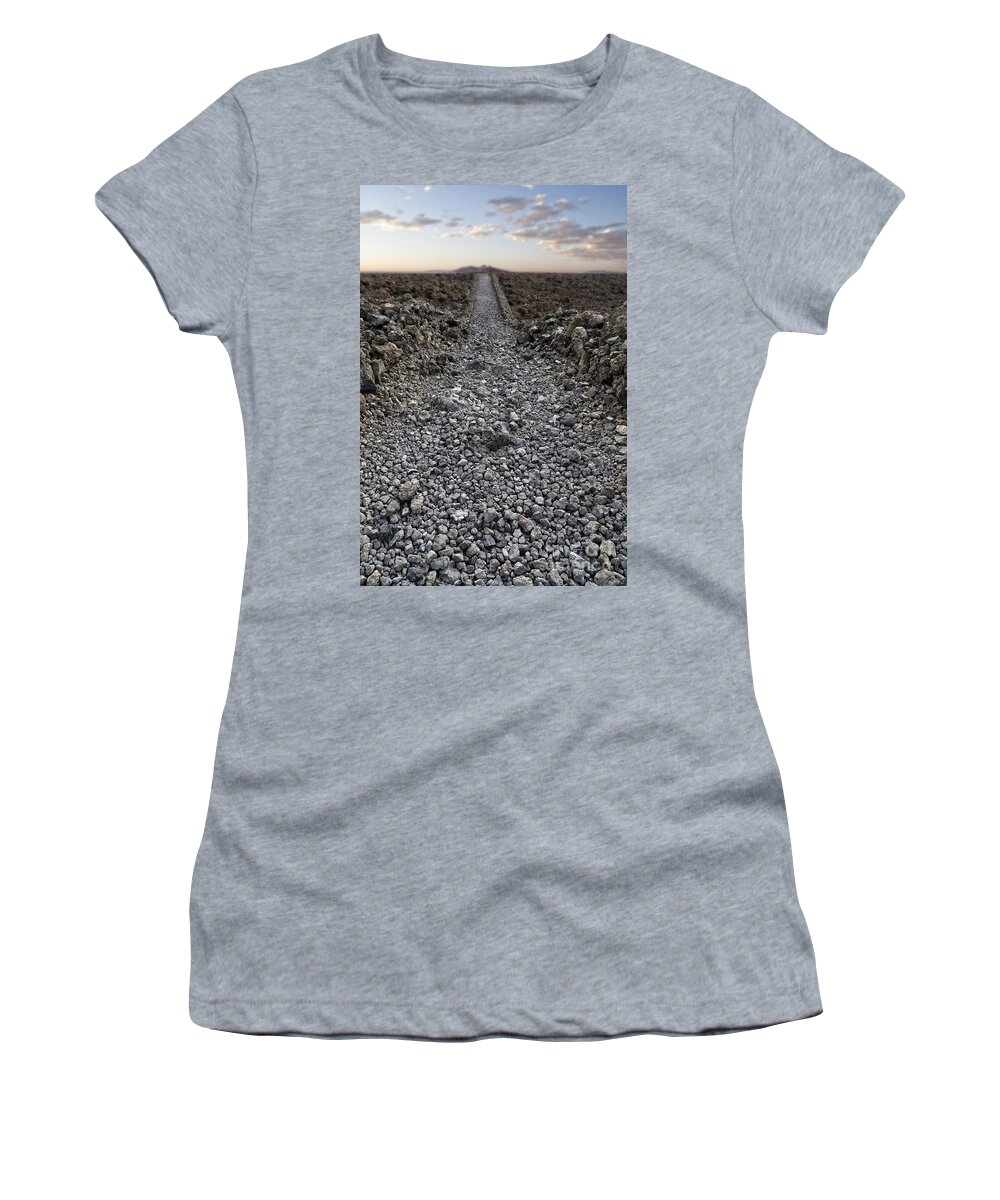 Hawaii Women's T-Shirt featuring the photograph Ancient rocky road leading to the horizon. by Edward Fielding