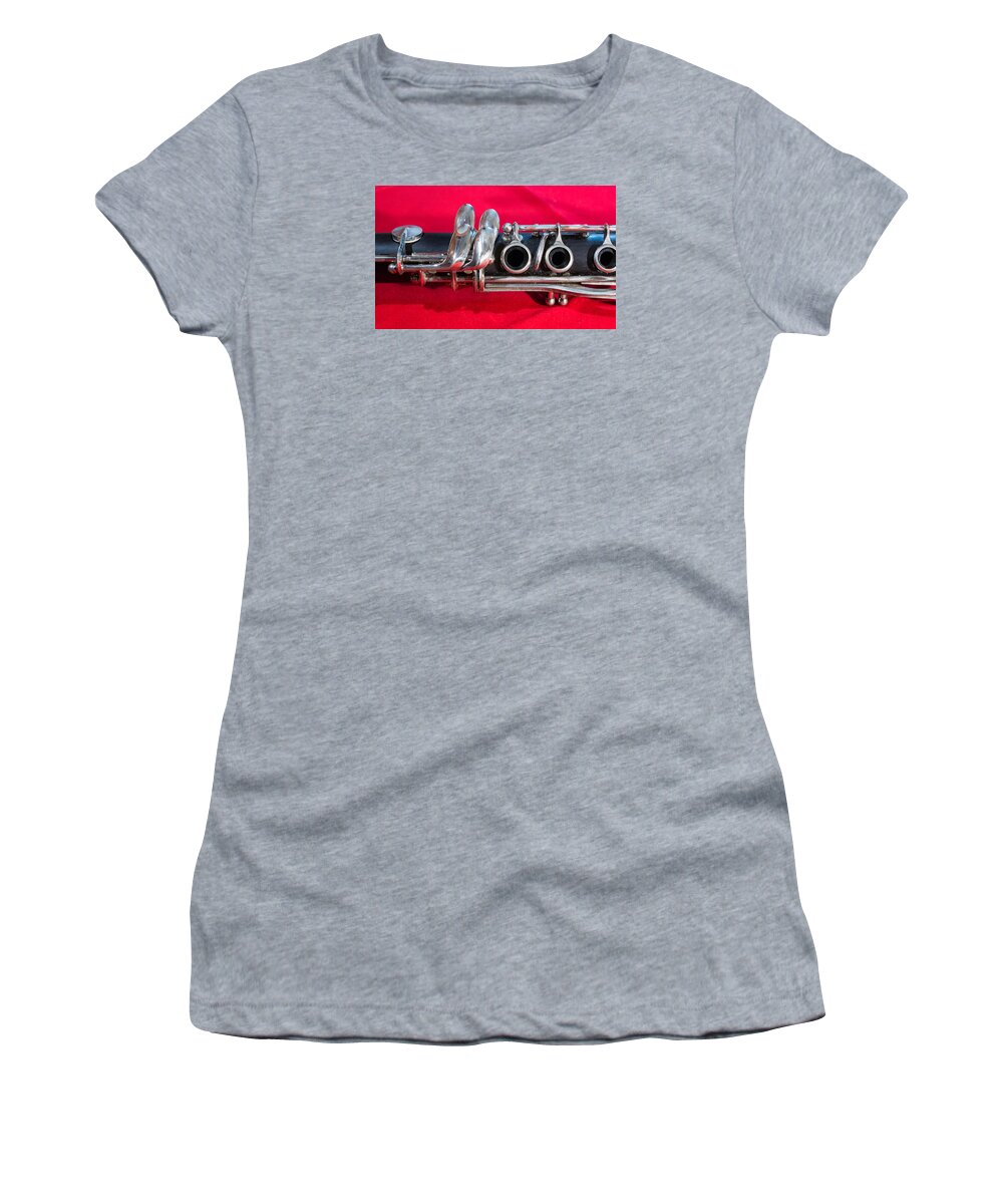 Clarinet Women's T-Shirt featuring the photograph Clarinet on Red by Photographic Arts And Design Studio