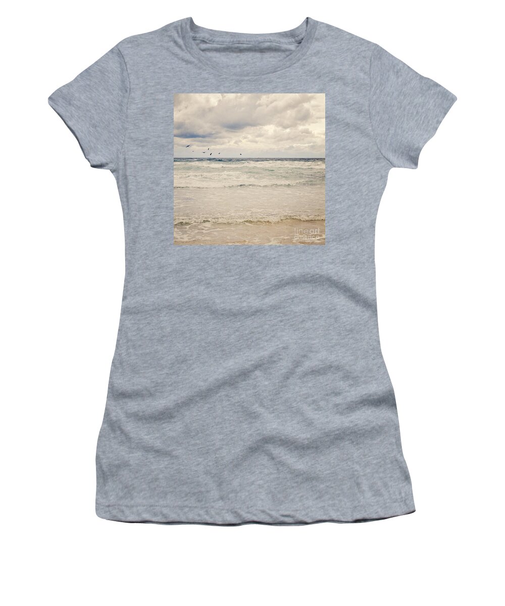 Birds Women's T-Shirt featuring the photograph Seagulls take flight over the sea by Lyn Randle